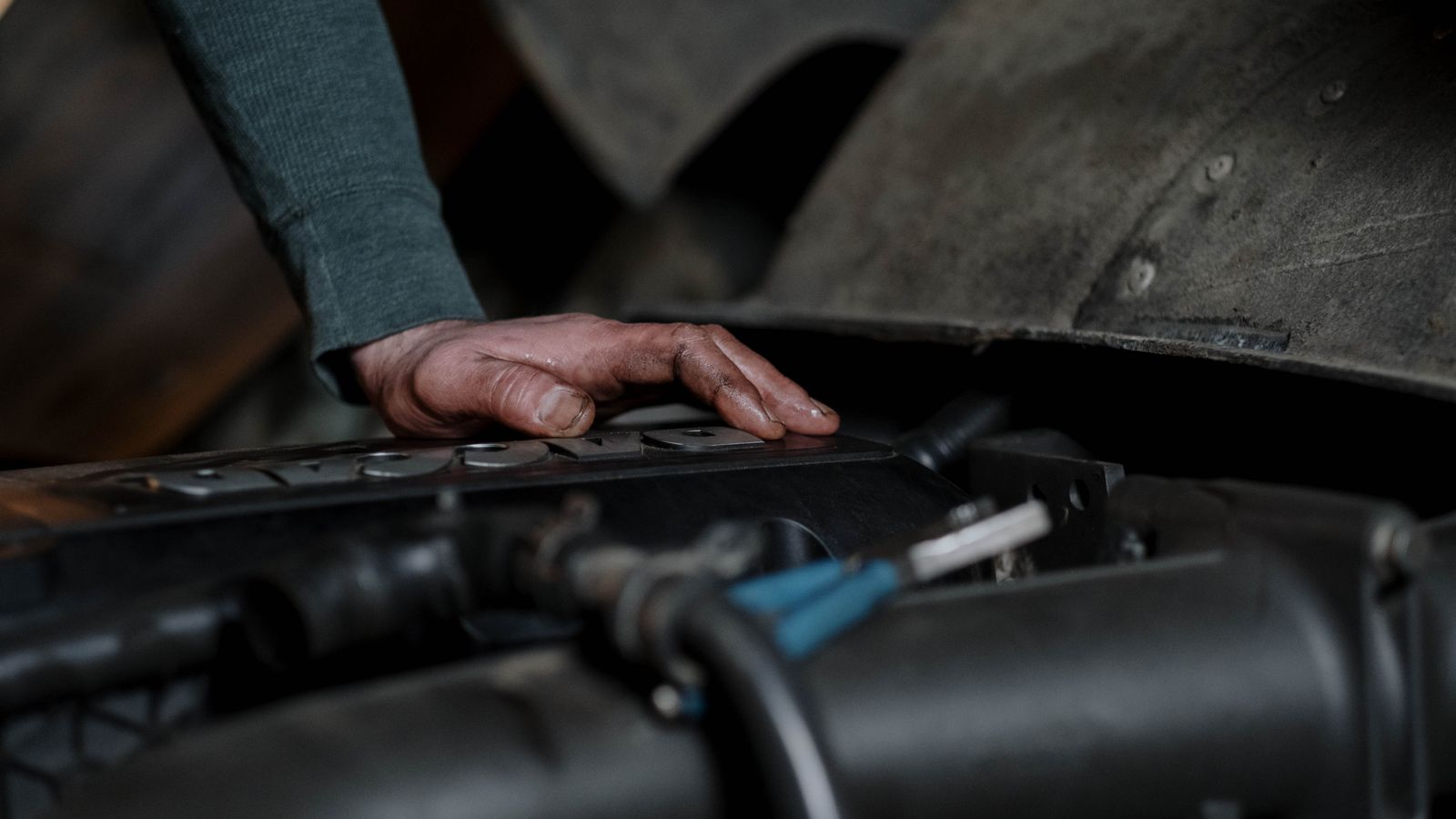 Mechanic checking a car engine