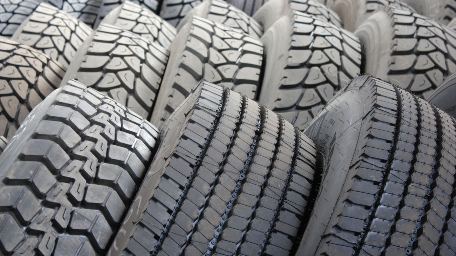 Rows of new tires showing deep tread